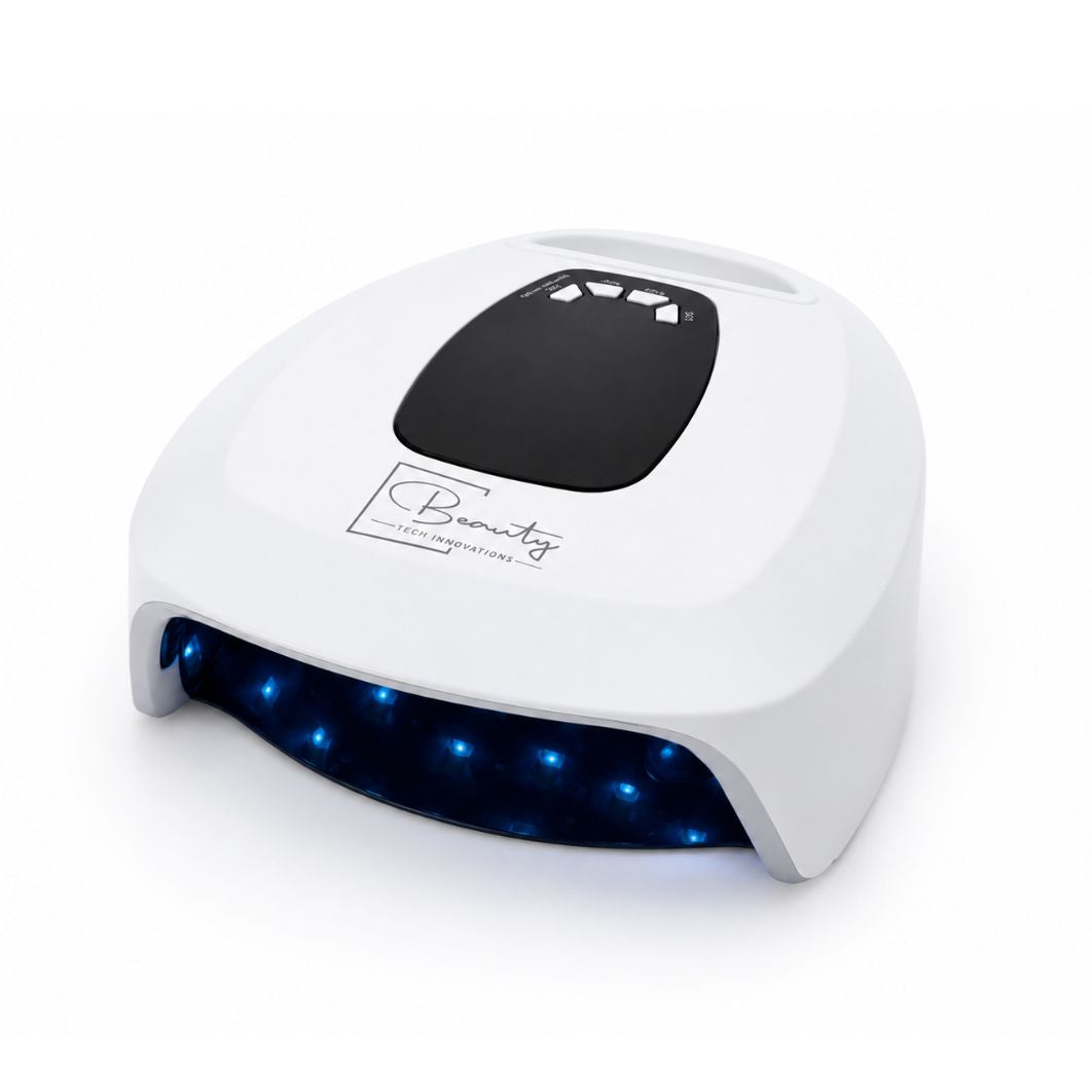Angled view of AuraLux cordless LED nail lamp featuring 108W power and professional curing technology