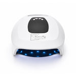 AuraLux cordless LED nail lamp with blue curing lights activated and professional salon design