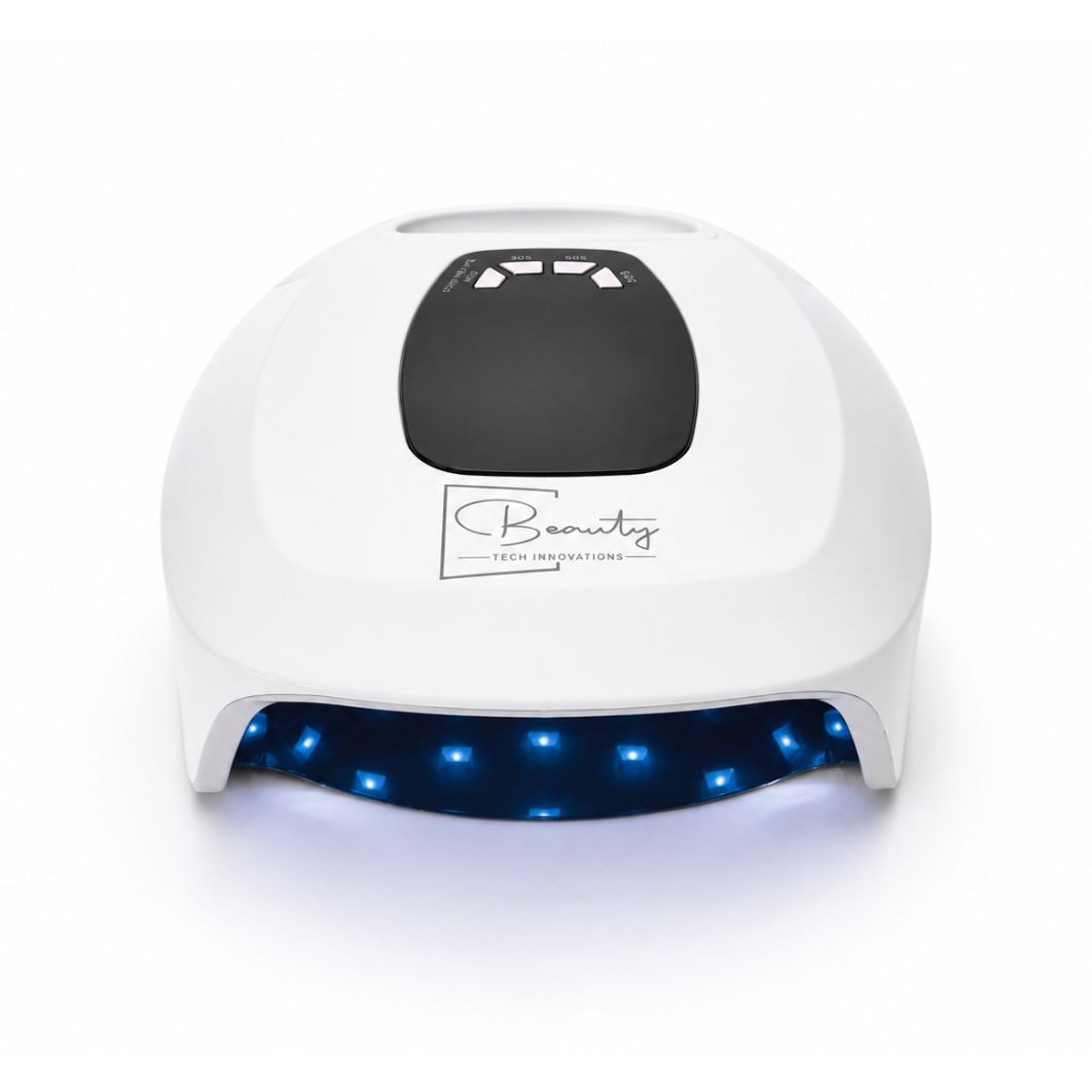 AuraLux cordless LED nail lamp with blue curing lights activated and professional salon design
