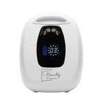 AuraLux cordless nail lamp with LCD display showing timer countdown and battery percentage indicator
